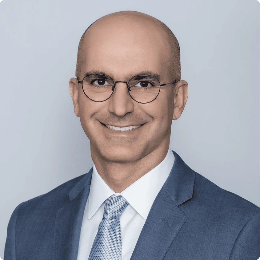 Dr. Kamruz Darabi, Triple Board-Certified Dermatologist