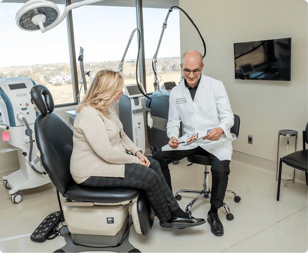 Dr. Darabi consulting with a patient